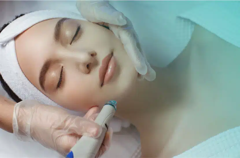 https://jovem-medspa.com/wp-content/uploads/2023/05/woman-receiving-microdermabrasion-therapy-forehead-beauty-spa-1.jpg